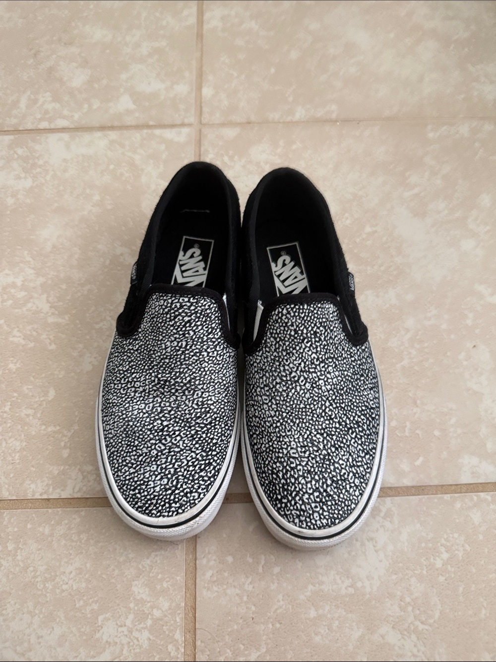 Vans Slip-On Sneakers in Black and White leopard Print